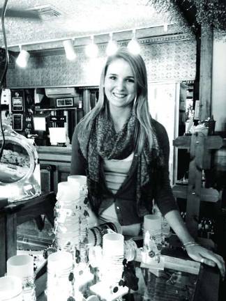 Pictured in the photo is Chelsea Sullivan modeling some Alex and Ani bracelets.