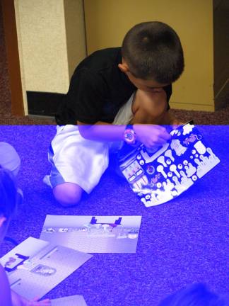 Anthony Fusco, 6, of Franklin creates his version of a science laboratory.