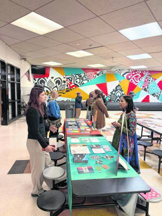Isabella Colavito of Delaware Valley meeting with Aimee Dolich of Savannah College of Art and Design.