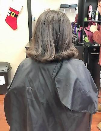 Area girl makes fifth hair donation
