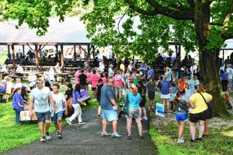 People arrive at the Franklin Firemen’s Memorial Pavilion for the 10th annual Changing the Face of Addiction Recovery Walk on Saturday, Aug. 3. More than 600 people took part in the event. (Photos by Maria Kovic)