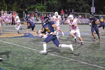 <b>JF1 Jefferson ball carrier Braedan Cummings on the run in the game against Whippany Park at home Friday, Sept. 26. Jefferson won, 48-26, and Cummings made one touchdown. (Photos by George Leroy Hunter)</b>
