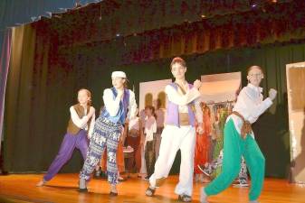 Omar, played by Lillian Docherty; Babkak, by Madison Sanfilippo; Aladdin, played by Vincent Cantu; and Kassem, played by Adelyn McGill.