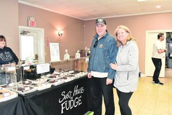 Susan and Mike Winge of Highland Lakes are shown by Sue’s House of Fudge.