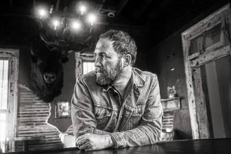 Americana pop/rock singer-songwriter JM Stevens recently released his full-length sophomore album, ‘Nowhere to Land.’ (Photo by Mark Abernathy)