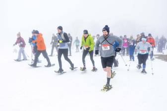 Participants in the Viking Snowshoe Invasion on Saturday, Jan. 27 at Mountain Creek begin the 5K race. About 50 people took part in the competition. (Photos by Sammie Finch)
