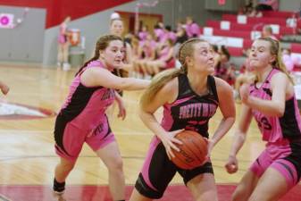 High Point's Olivia Wagner looks up while handling the ball in the 14th annual Pretty in Pink fundraiser Saturday, Jan. 13. She scored 19 points, and High Point defeated Wallkill Valley, 46-33. (Photo by George Leroy Hunter)