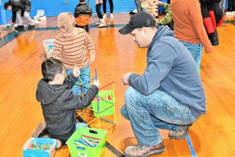 Corey Houghtaling watches his son Andrew play at Family STEM Day on Feb. 20 at Franklin Borough School. (Photos by Maria Kovic)