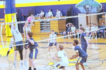 The Vikings and Falcons battle on the volleyball court April 23. Vernon won, 2-1. (Photos by George Leroy Hunter)