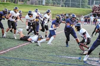 Jefferson ball carrier Braedan Cummings finds some running room in a game against West Milford last fall. (File photo by George Leroy Hunter)