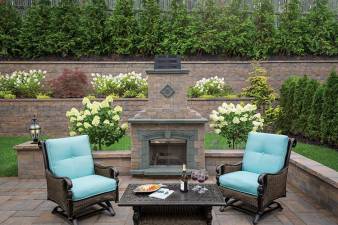 An outdoor fireplace kit, plus stone walls and pavers.