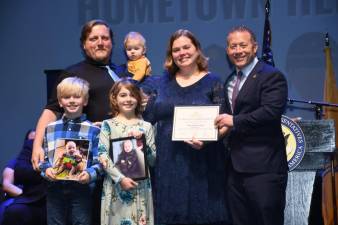 Rep. Josh Gottheimer, D-5, poses with Fifth District Hometown Heroes Darrin and Kim Chambers and their children. (Photo provided)