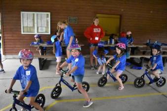 Children practice bike safety during the Safety Town program in Hardyston. (Photos by Laurie Gordon)