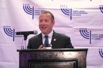 U.S. Rep. Josh Gottheimer receives the “Excellence in Leadership Award” from the North Jersey Jewish Business Alliance