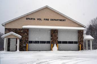 A snowman stands in front of the Sparta Volunteer Fire Department on Sunday, Jan. 7.