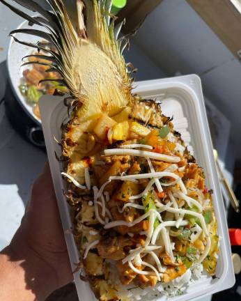 <b>Stir fry in a pineapple from Tiki Turbo.</b>