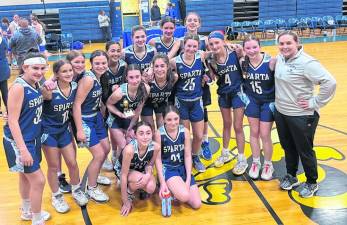 The Sparta Middle School girls team placed first. At right is the coach, Amy Tripold. (Photos provided)