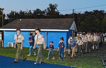 Scouts march in to the annual 9/11 Lights Memorial Service on Thursday, Sept. 11 at the Franklin Pond. (Photos by Maria Kovic)
