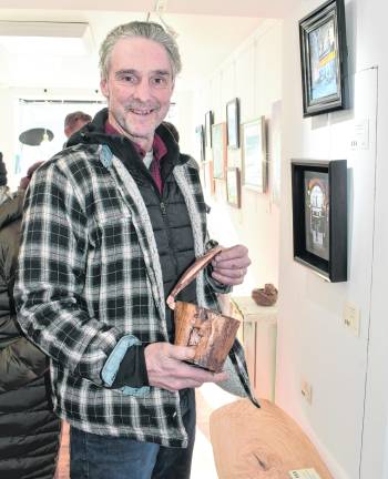 <b>Christ FitzSimmons of Sparta poses with a Scowl Box.</b>