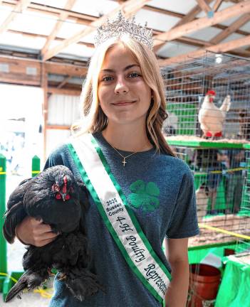 <b>Auelia Giordano, a 4-H poultry representative, at the fair Saturday, Aug. 2. (Photo by Nancy Madacsi)</b>
