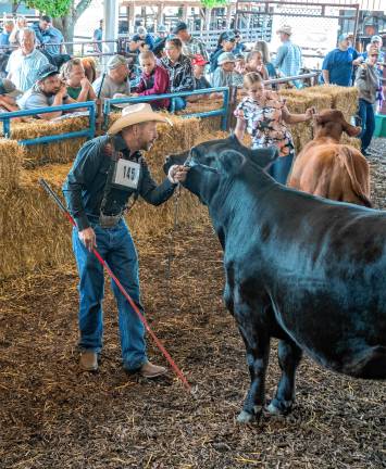 <b>The dairy competition Tuesday, Aug. 5. (Photo by Nancy Madacsi)</b>