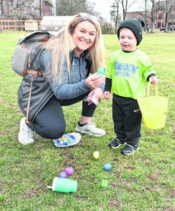 <b>Jamie and Branch Borger of Newton show off their eggs.</b>