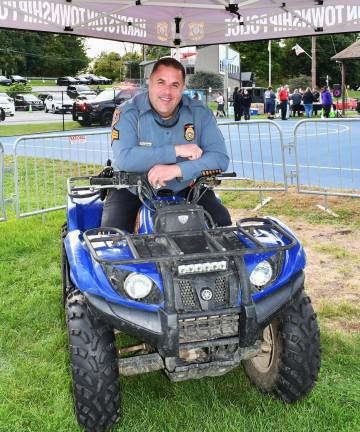 Hardyston police Sgt. Brad Worman poses on a quad.