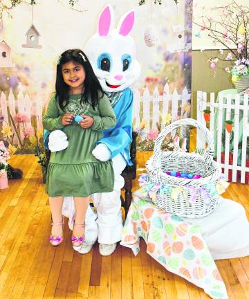 Chloe Chabla of Sussex poses with the Easter Bunny.