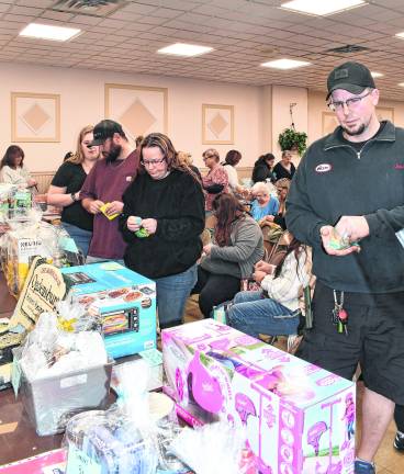 People look over the prizes.