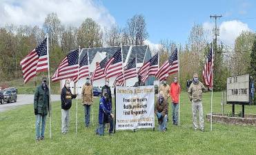 Vernon Rotary raises flags to lift spirits
