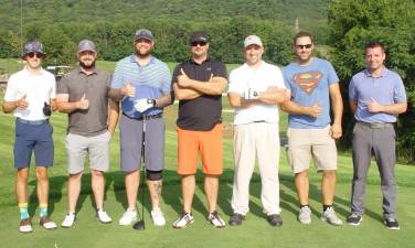 Contestants in the 1st qualifier for the Sussex County Long Drive Championship give the event a thumbs up
