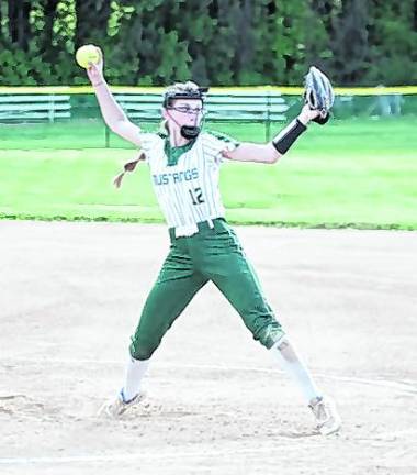 <b>Sussex Tech pitcher Alexandra Sweetman in throw motion. Sweetman scored 2 runs for her team.</b>
