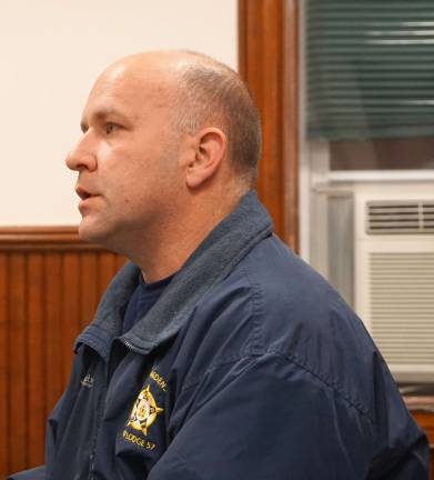 Police Chief Stephen Gordon reviews police shift issues.