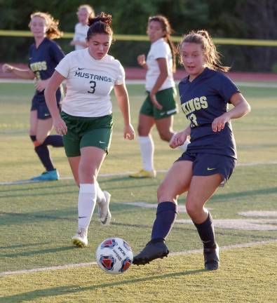 Vernon's Martina Brich passes the ball with her foot in the first half. Brich scored 1 goal