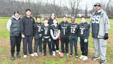 The Baltimore Ravens pose during the Turkey Bowl.