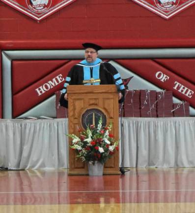 PHOTOS BY VERA OLINSKI Superintendent Scott D. Ripley addresses the High Point graduates.