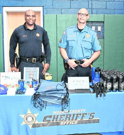 <b>Ronnie Anglin and John Henderson of the Morris County Sheriff's Dept. of Corections ose for a photo.</b>
