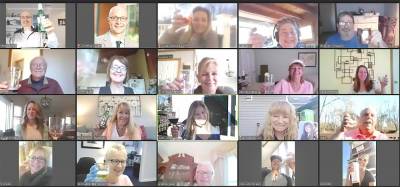 The Green Team Realty associate brokers and agents toast each other on the firm’s first Virtual Happy Hour held last Friday, March 27.