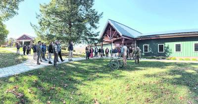 <b>Stephen Mellett and Charles A. DeAngelis from Vericon Construction welcome attendees before the ceremonial cannon fire.</b>