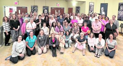 <b>Local breast cancer survivors celebrate during a previous Survivor Event at Project Self-Sufficiency.</b>