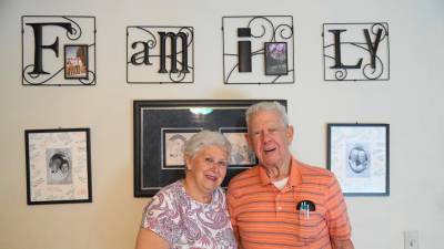 Pat and George Sabourin pose for a photo