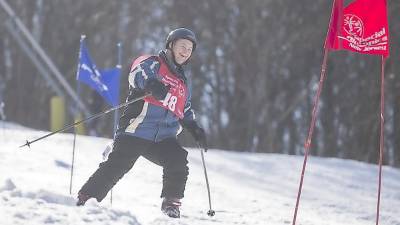 An athlete skis down the slope at Mountain Creek.