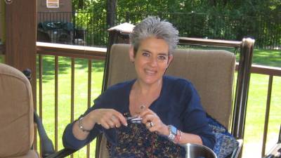 Vernon Township Women’s Club member Liliana Pappas knits during the club’s afternoon meeting.