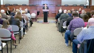 Councilman Carl Miller reads aloud Hardyston Township Veteran’s names.