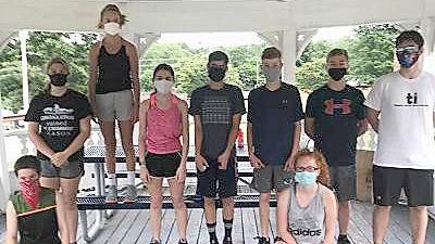 The masked runners: Members of the Kittatinny Regional High School Cross Country Team wear masks while discussing the day's workout. Masks are required at all practices except when teams are socially distancing. (Photo by Laurie Gordon)
