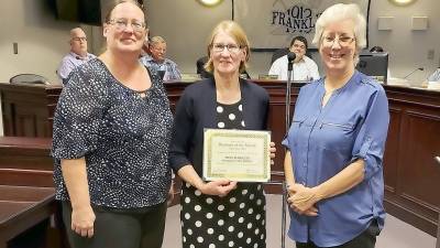 Weis Markets was presented with the September Business of Month Award by the Economic Development Committee. Vice Chairwoman Patti Carnes cited they were nominated because of all the things they do for the community including Stuff the Bus and Cram the Cruiser events.