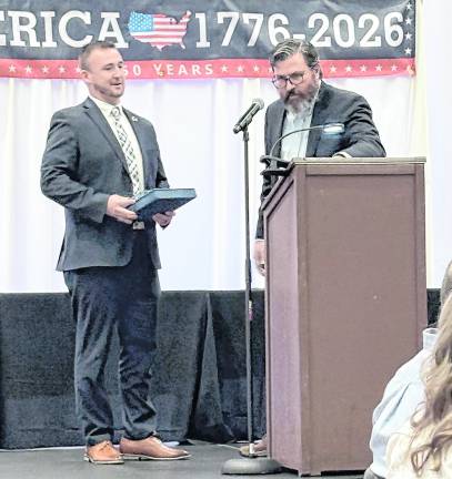<b>Dr. Cory Homer receives the Chairman’s Award presented by past Chair, Mike Richards.</b>