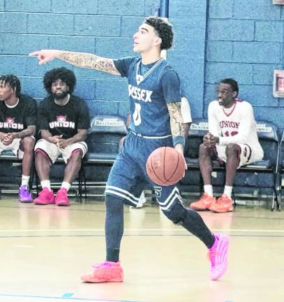 <b>Sussex County's Nico Sosa handles the ball in the second period.</b>