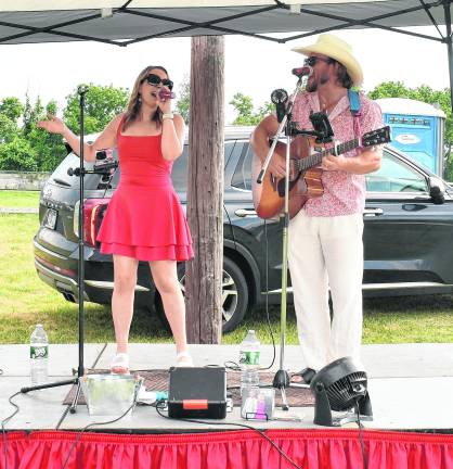 October Rose performs on stage.