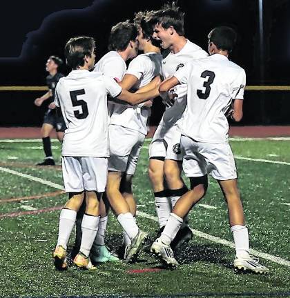 Wallkill Valley boys soccer team celebrates a win.